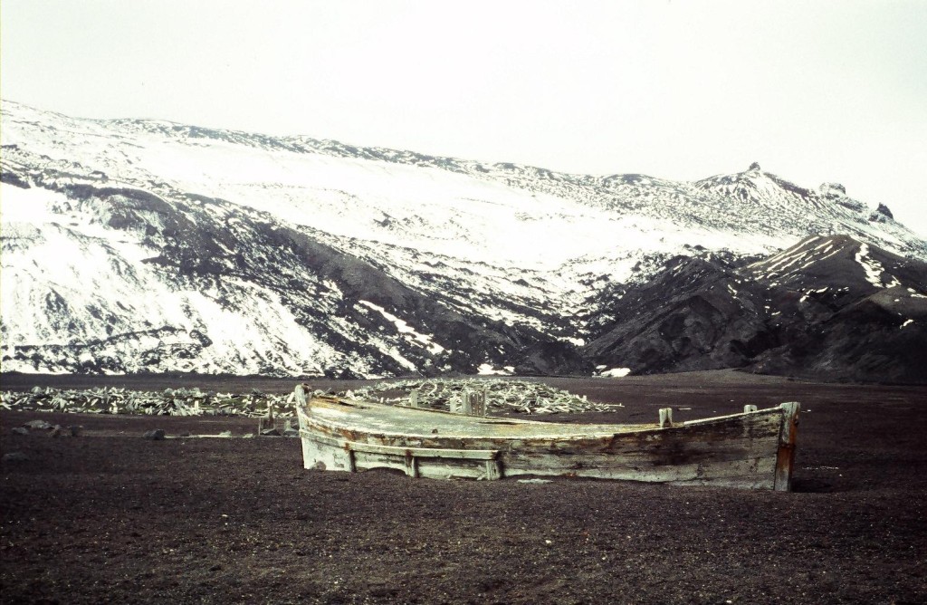 A decked dory from the whaling days abandonned on the beach at Deception Island, South Shetland Islands. The heat from the volcanism keeps all the low ground free of the ice and snow that otherwise cover all lands year-round at this latitude.